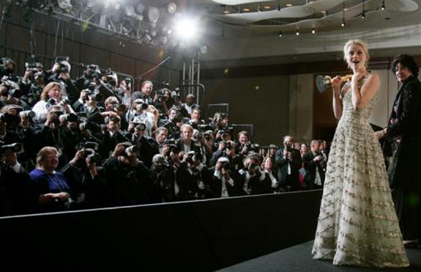 Best Actress winner Reese Witherspoon reacts backstage to the announcement that "Crash" won the best picture Oscar at the 78th annual Academy Awards in Hollywood March 5, 2006. Witherspoon won for her performance in "Walk the Line." (REUTERS)