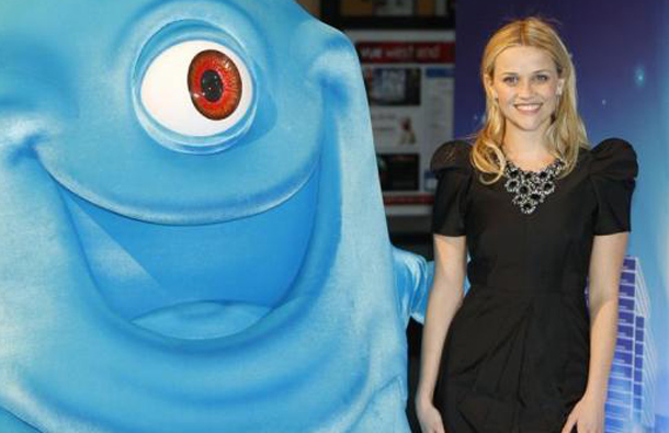 US actress Reese Witherspoon poses with the film character B.O.B. as she arrives for the UK premiere of "Monsters vs. Aliens" in Leicester Square in London March 11, 2009. (REUTERS)