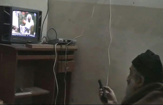 Osama bin Laden in Abbottabad, Pakistan, by the US Department of Defense a man, who the American government identified as Osama bin Laden, watches himself on television. US intelligence would not confirm that the video of bin Laden in the makeshift office was filmed at the Pakistani compound, but they have said they believe he has been holed up in the compound for as long as six years. (AP)