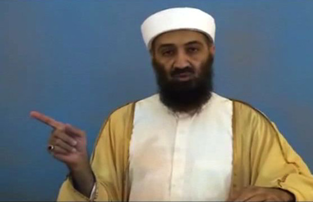 Osama bin Laden is shown speaking in this undated image taken from video provided by the US Department of Defense and released on Saturday1. The videos show bin Laden watching himself on television and rehearsing for terrorist videos. (AP)