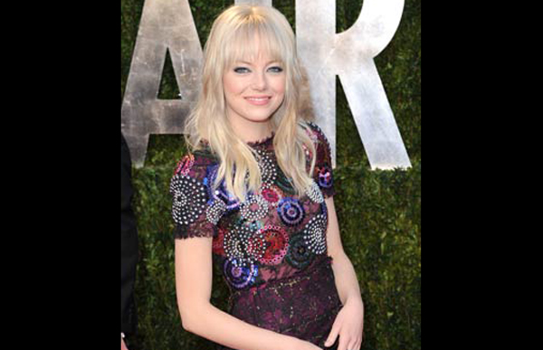 Emma Stone: Actress Emma Stone arrives at the Vanity Fair Oscar party hosted by Graydon Carter held at Sunset Tower in West Hollywood, California. (GETTY)