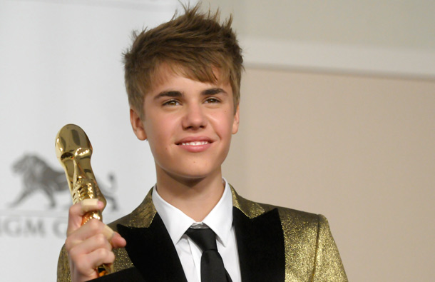 Singer Justin Bieber poses in the press room at the 2011 Billboard Music Awards in Las Vegas. (AP)