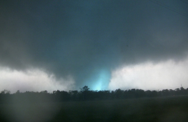 This frame grab from video shows lightning inside a massive tornado, outside Joplin, Mo. The tornado tore a 6-mile path across southwestern Missouri killing at least 89 people as it slammed into the city of Joplin, ripping into a hospital, crushing cars like soda cans and leaving a forest of splintered tree trunks behind where entire neighborhoods once stood. (AP)