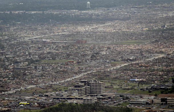 A destroyed neighborhood is seen in Joplin, Mo. A large tornado moved through much of the city Sunday, damaging a hospital and hundreds of homes and businesses. (AP)