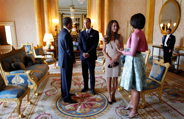 US President Barack Obama and first lady Michelle Obama meet with Britain's Prince William and Catherine, the Duke and Duchess of Cambridge, at Buckingham Palace in London. (AP)