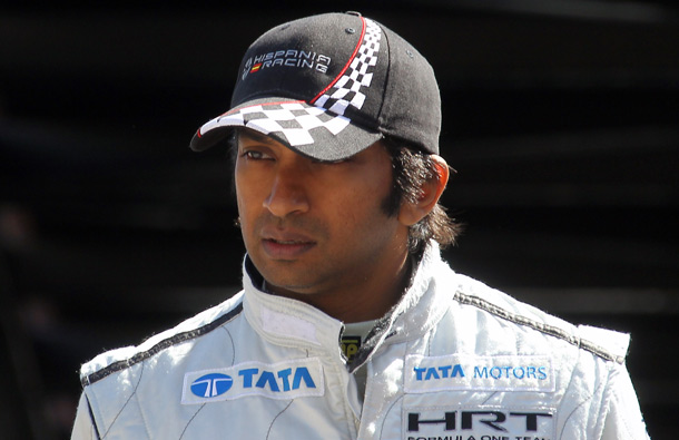 HRT F1 Team's Indian driver Narain Karthikeyan walks at the Circuit de Monaco on May 28, 2011 in Monte Carlo during the third practice race of the Monaco Formula One Grand Prix. (AFP)