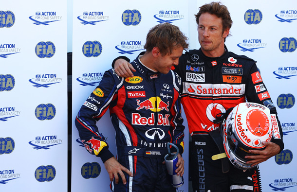 Pole sitter Sebastian Vettel (L) of Germany and Red Bull Racing is seen with second placed Jenson Button (R) of Great Britain and McLaren following qualifying for the Monaco Formula One Grand Prix at the Monte Carlo Circuit in Monte Carlo, Monaco. (GETTY/GALLO)