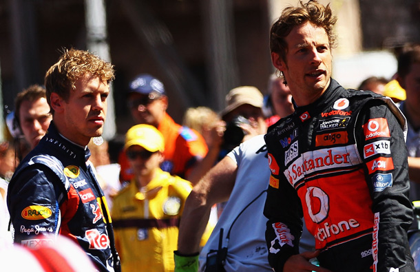 Pole sitter Sebastian Vettel (L) of Germany and Red Bull Racing is seen with second placed Jenson Button (R) of Great Britain and McLaren following qualifying for the Monaco Formula One Grand Prix at the Monte Carlo Circuit in Monte Carlo, Monaco. (GETTY/GALLO)