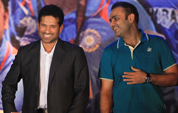 Indian cricketer Sachin Tendulkar, left, and Virender Sehwag look on during the BCCI Award ceremony in Mumbai, India. (AP)