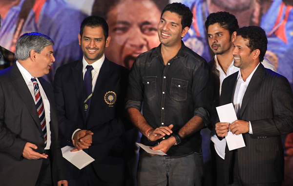 President of The Board of Control for Cricket in India (BCCI) Shashank Manohar, left, interacts with Indian cricketers Mahendra Singh Dhoni, second left, Yuvraj Singh, center, S. Sreesanth, second right, and Sachin Tendulkar, right, during the BCCI Awards ceremony in Mumbai, India. (AP)