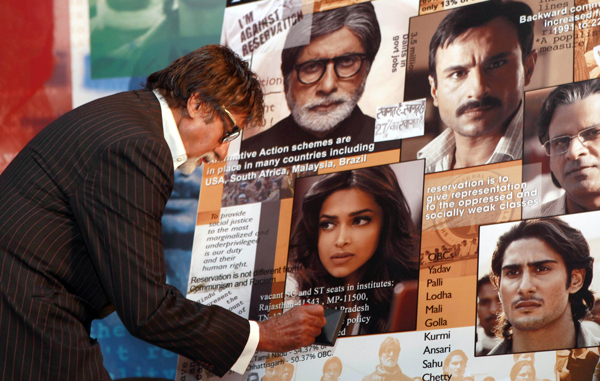 Indian Bollywood film actor Amitabh Bachchan attends the first screening of upcoming Hindi film 'Aarakshan' in Mumbai on June 9, 2011. (AFP)