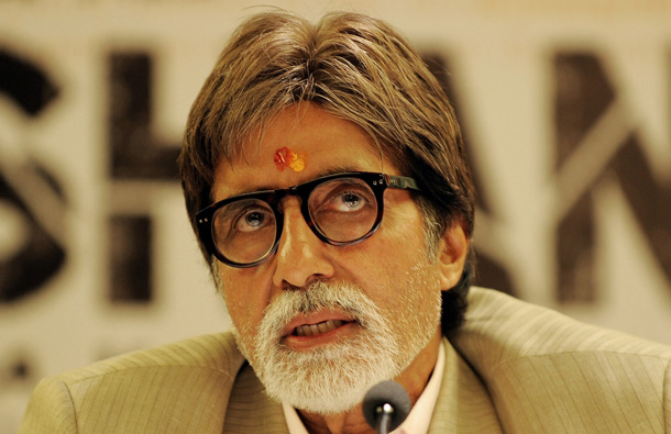 Indian Bollywood actor Amitabh Bachchan addresses media representatives in New Delhi during a promotional event for his forthcoming film 'Aarakshan' (Reservation). (AFP)