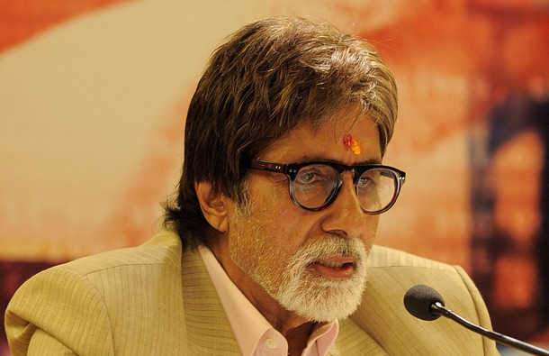 Indian Bollywood actor Amitabh Bachchan addresses media representatives in New Delhi during a promotional event for his forthcoming film 'Aarakshan' (Reservation). (AFP)