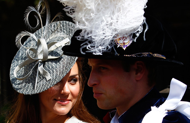 Catherine, Duchess of Cambridge (L), sits next to her husband Prince William, Prince of Wales as they leave the Order of the Garter service at St. George's chapel inside the grounds of Windsor Castle in Windsor, England. (GETTY/GALLO)