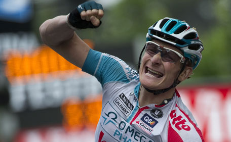 Germany's Andre Greipel celebrates on the finish line at the end of the 158 km and tenth stage of the 2011 Tour de France cycling race run between Aurillac and Carmaux, southwestern France on July 12 , 2011. (AFP)