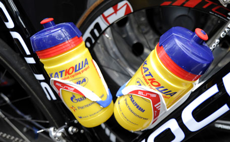 Thomas Voeckler of France, wearing the overall leader's yellow jersey, discusses with another rider during the 10th stage of the Tour de France cycling race over 158 kilometers (98.2 miles) starting in Aurillac and finishing in Carmaux, south central France, Tuesday July 12, 2011. (AP)