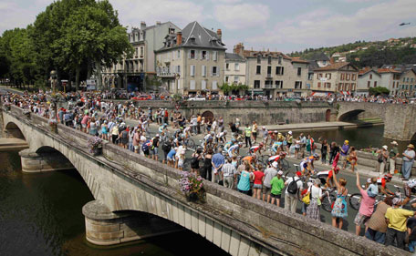 Feeding bottles of Russia Katusha cycling team are seen prior to the start of the158 km and tenth stage of the 2011 Tour de France cycling race run between Aurillac and Carmaux, southwestern France on July 12 , 2011. Russian cyclist Alexandr Kolobnev (Katusha) became the first rider to be forced out of the Tour de France yesterday, after an A sample from the Katusha rider tested positive for a banned substance.  (AFP)