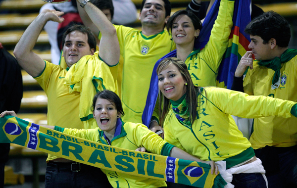 Brazil soccer fans cheer before the start of a Group B Copa America soccer match against Ecuador in Cordoba, Argentina. (AP)