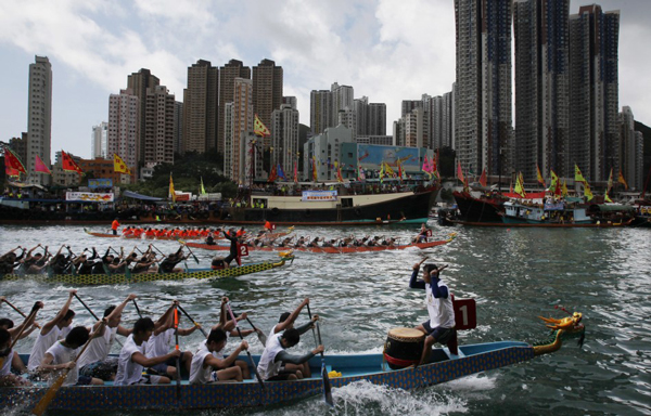 Hong Kong: Participants compete in a dragon boat race to mark the annual Tuen Ng or Dragon Boat Festival in Hong Kong. (REUTERS)