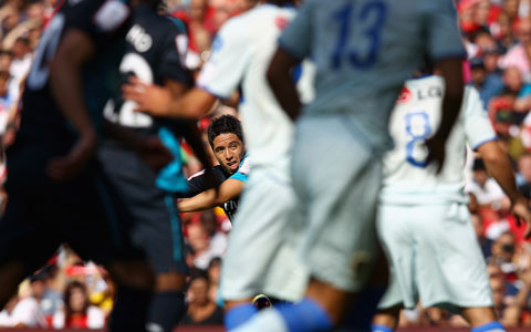 Samir Nasri of Arsenal takes a free kick during the Emirates Cup match between Arsenal and Boca Juniors at the Emirates Stadium on July 30, 2011 in London, England. (Getty Images)