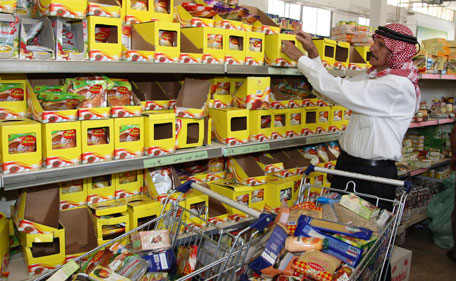 A resident shops at the Civil Service Consumer Corporation in Amman July 28, 2011, ahead of the fasting month of Ramadan. Muslims around the world abstain from eating, drinking and conducting sexual relations from sunrise to sunset during Ramadan, the holiest month in the Islamic calendar. (REUTERS)