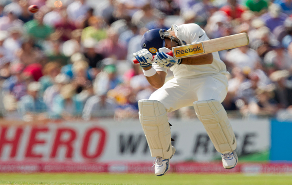 India's Youvraj Singh avoids a bouncer from England's Tim Bresnan on the second day of their cricket Test match at Trent Bridge cricket ground, Nottingham, England. (AP)