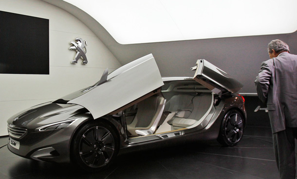 The Peugeot HX-1 is on display during the Frankfurt Auto Show IAA in Frankfurt, Germany, Tuesday, Sept. 13, 2011. The fair opens its doors to the public from Sept.15 through Sept. 25, 2011. (AP)