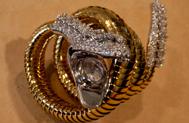 Elizabeth Taylor's diamond, emerald and gold "Snake" bracelet watch, by BVLGARI, circa 1961, estimated at $12,000 - $15,000, is shown in this photograph at Christie's, in New York. (AP)