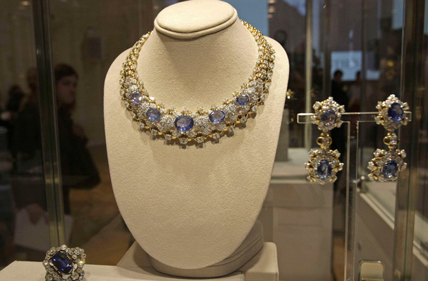 Diamond and sapphire necklace and earrings of Mouaward from the Elizabeth Taylor collection are shown in Moscow's GUM department store at a pre-auction Christie's exhibition. The auction will take place in December in New York. (AP)