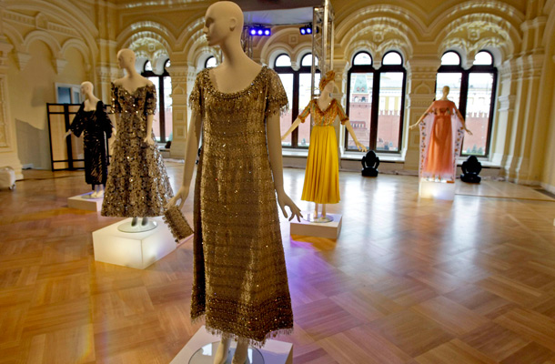 Dresses from the Elizabeth Taylor collection are shown in Moscow's GUM department store at a pre-auction Christie's exhibition. The auction will take place in December in New York. (AP)