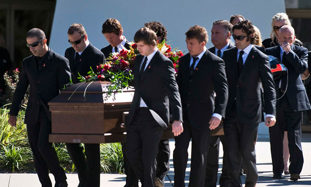 Mourners line up outside the First Presbyterian Chuch in an attempt to get a seat for IndyCar driver Dan Wheldon's funeral service Saturday, Oct 22, 2011, in St Petersburg, Fla.  Wheldon was killed Sunday, Oct 16, 2011, in a fiery 15-car crash at the Las Vegas Motor Speedway. (AP)