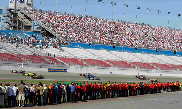 Drivers take five tribute laps in honor of Dan Wheldon, a two-time Indianapolis 500 winner who died following a crash in the IndyCar Series' Las Vegas Indy 300 auto race earlier Sunday, Oct 16, 2011, in Las Vegas. (AP)