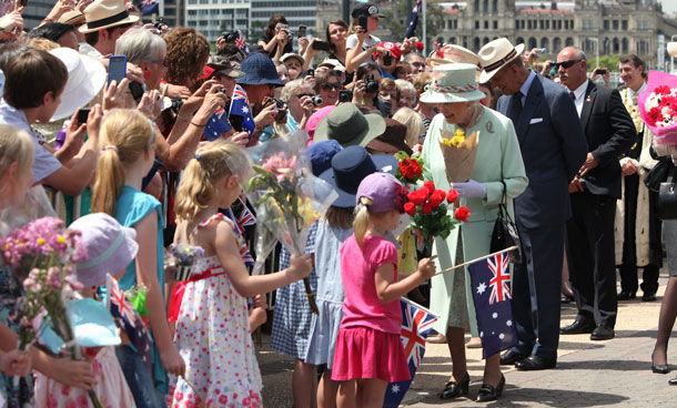 Queen Elizabeth II greets the crowd along the Brisbane River on October 24, 2011 in Brisbane, Australia. The Queen and Duke of Edinburgh are on a 10-day visit to Australia and will travel to Canberra, Brisbane, and Melbourne before heading to Perth for the Commonwealth Heads of Government meeting. This is the Queen's 16th official visit to Australia. (GETTY)