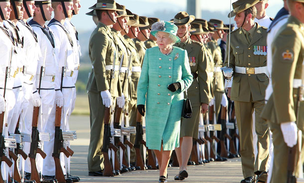 Queen Elizabeth II speaks to members of the armed forces as she arrives on October 19, 2011 in Canberra, Australia. The Queen and Duke of Edinburgh are on a 10-day visit to Australia and will travel to Canberra, Brisbane, Melbourne before heading to Perth for the Commonwealth Heads of Government meeting. This is the Queen's 16th official visit to Australia. (GETTY)