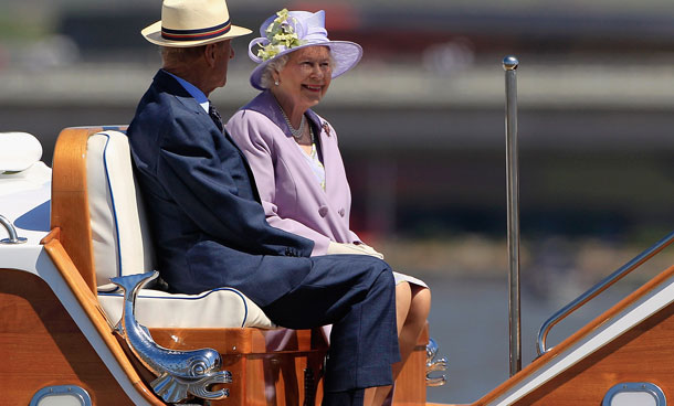 Queen Elizabeth II and Prince Phillip, Duke of Edinburgh enjoy a cruise on a navy barge on Lake Burley Griffin on October 20, 2011 in Canberra, Australia. The Queen and Duke of Edinburgh are on a 10-day visit to Australia and will travel to Canberra, Brisbane, and Melbourne before heading to Perth for the Commonwealth Heads of Government meeting. (GETTY)