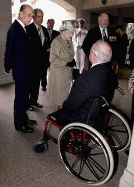 Queen Elizabeth ll and Prince Phillip, Duke of Edinburgh pause to talk to War Memorial Council member and former federal politician Graham Edwards, who lost both legs during the Vietnam war, during a visit to the Australian War Memorial on October 25, 2011 in Canberra, Australia. (GETTY)