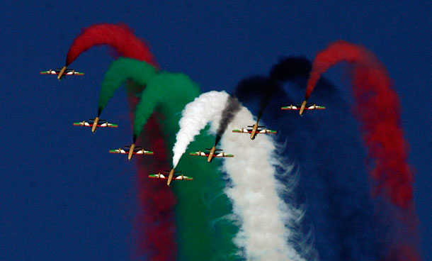 Planes perform at the Dubai airshow in Dubai, United Arab Emirates, Sunday, Nov 13, 2011. Dubai's fast-growing airline Emirates kicked off the Middle East's biggest airshow Sunday with a huge order for 50 Boeing 777s, marking the US aircraft maker's biggest-ever single order in dollar terms. (AP)