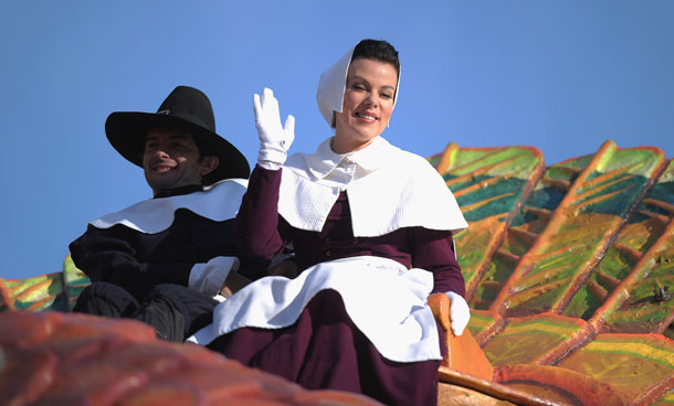 Actress Debbi Mazar (R) and husband Gabriele Corcos sit atop a turkey float during the 85th Annual Macy's Thanksgiving Day Parade on November 24, 2011 in New York City. (AFP)