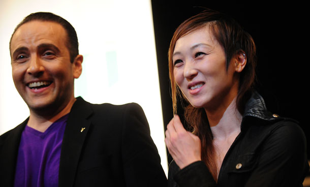 Japanese dancer and choreographer Motoko Hirayama (R) and Romanian contemporary dancer Razvan Mazilu (L) laugh during a press conference two days ahead of the premiere of their  “Requiem. You don’t know anything about me” ballet show at the Odeon Theater  in Bucharest on November 22, 2011. (AFP)