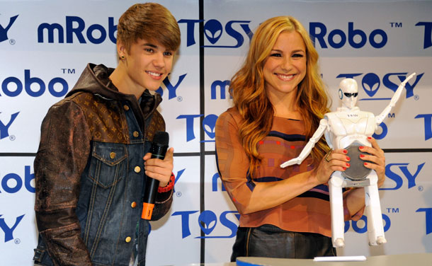 Justin Bieber appears at TOSY Robotics booth at 2012 CES