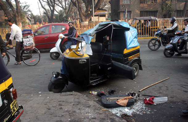 Wreckage of an auto rickshaw after nine people were killed and 27 injured  when a bus driver went on a rampage in the western Indian city of Pune, Maharastra on 25 January 2012  ramming vehicles and hitting pedestrians. The 27 injured have been admitted to three hospitals in the city.