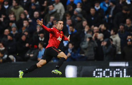 Robin van Persie of Manchester United celebrates scoring the winning goal during the Barclays Premier League match against Manchester City at the Etihad Stadium on December 9, 2012 in Manchester, England. (GETTY)