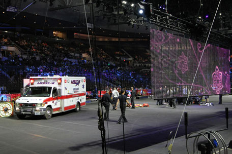 First responders work at the center ring after a platform collapsed during an aerial hair-hanging stunt at the Ringling Brothers and Barnum and Bailey Circus, Sunday, May 4, 2014, in Providence, R.I. At least nine performers were seriously injured in the fall, including a dancer below, while an unknown number of others suffered minor injuries. (AP)