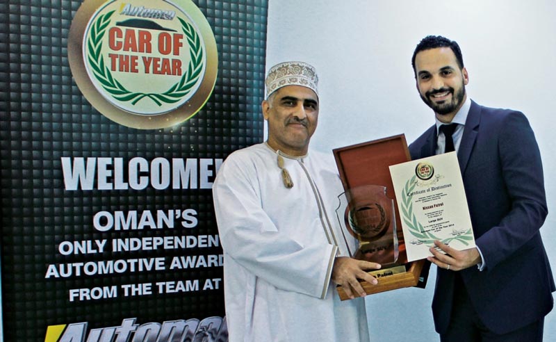 Katib Belkhodja, Brand Manager for SUVs and Crossovers in Nissan Middle East receiving the award from Automan Middle East team. (Supplied)