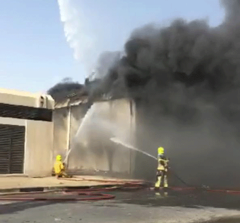 Firemen battling to control the blaze. (Pic: Dubai Civil Defence)