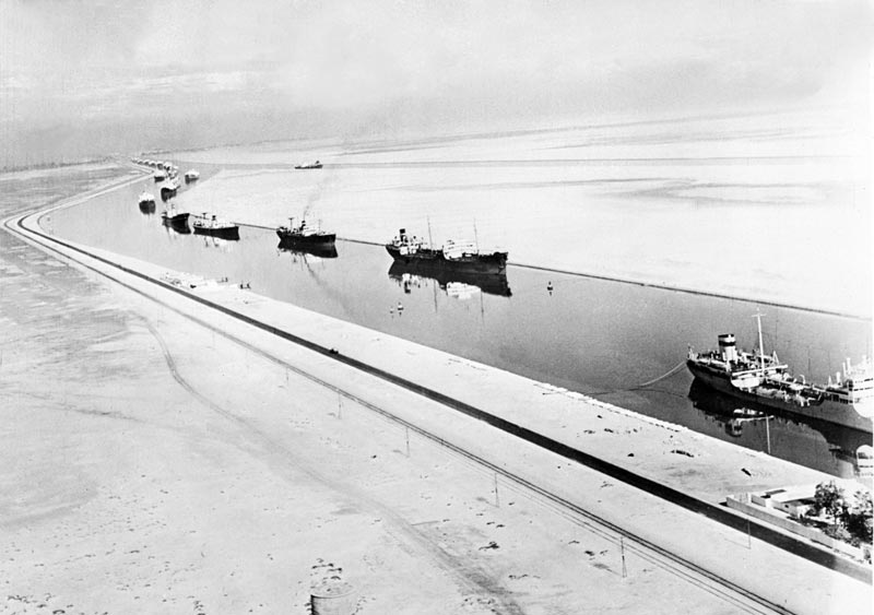 (FILES) An undated file picture shows ship going through the Suez Canal. Egypt on August 6, 2015 inaugurates a new Suez Canal waterway touted as an achievement rivalling the digging of the original, as it seeks to boost both its e