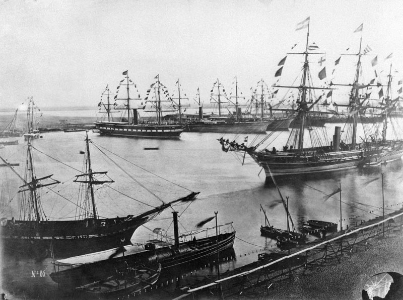 (FILES) A picture dated on November 1869 shows the inauguration of the Suez Canal in Egypt. Egypt on August 6, 2015 inaugurates a "new Suez Canal" waterway touted as an achievement rivalling the digging of the original, as it seeks to boost both its economy and international standing. The new 72-kilometre (45-mile) waterway built in less than a year at a cost of $9 billion (7.9 billion euros) runs part of the way alongside the existing canal connecting the Red Sea and the Mediterranean. AFP PHOTO