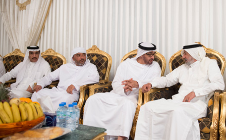 Sheikh Mohamed bin Zayed Al Nahyan Crown Prince of Abu Dhabi Deputy Supreme Commander of the UAE Armed Forces (2nd R), offers condolences to the family of martyr Mohamed Mamdi who passed away while serving in Operation Restoring Hope in Yemen. Seen with HE Ahmed Juma Al Zaabi, UAE Deputy Minister of Presidential Affairs (L). (Saeed Al Neyadi / Crown Prince Court - Abu Dhabi)