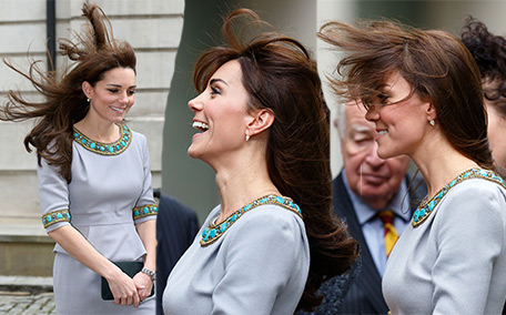 Gone with the wind! Duchess struggles to contain her bouncy locks ...