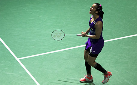 Saina Nehwal in action during her match against Carolina Marina in the Dubai World Superseries Finals on Thursday at Hamdan Sports Complex. (Getty Images)